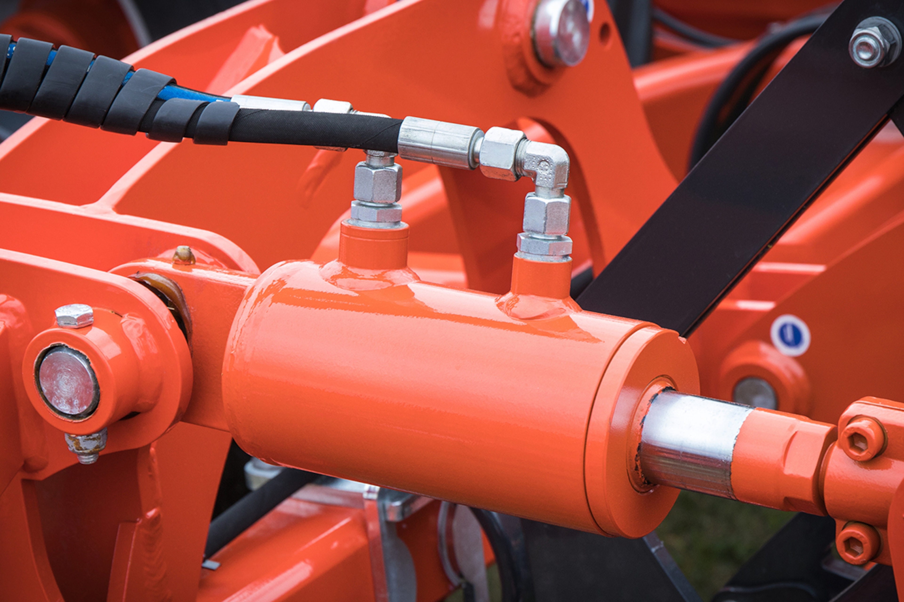 Orange hydraulic cylinder