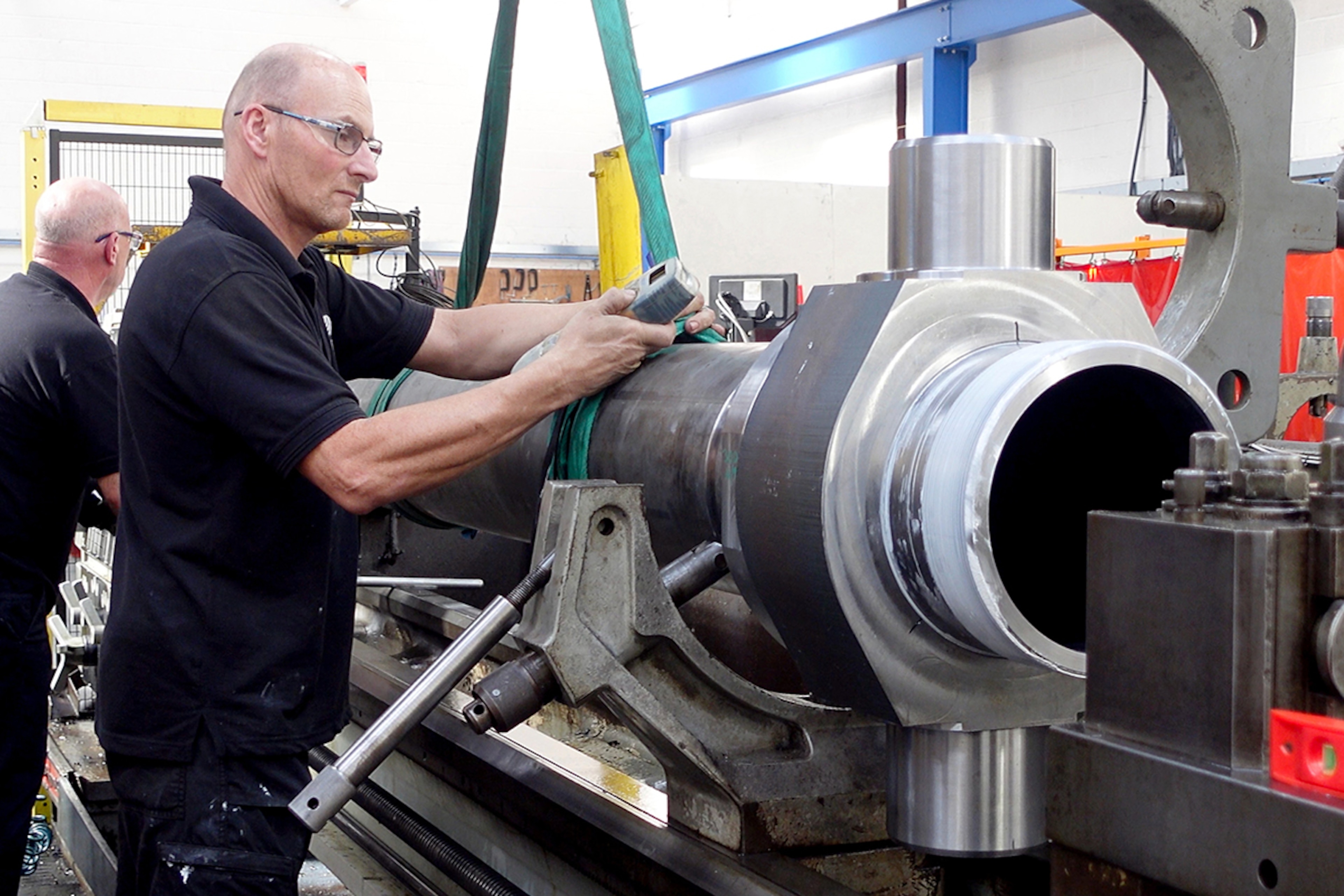 Hydraulic Cylinder being worked on by Flowtech Engineer